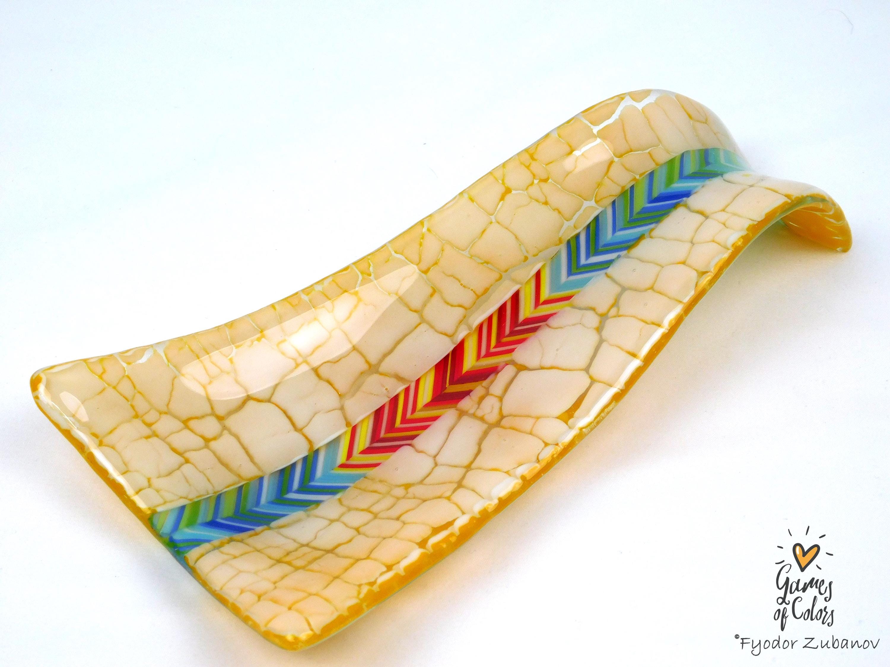 A fused glass decorative spoon rest "Sunburst Drift""
