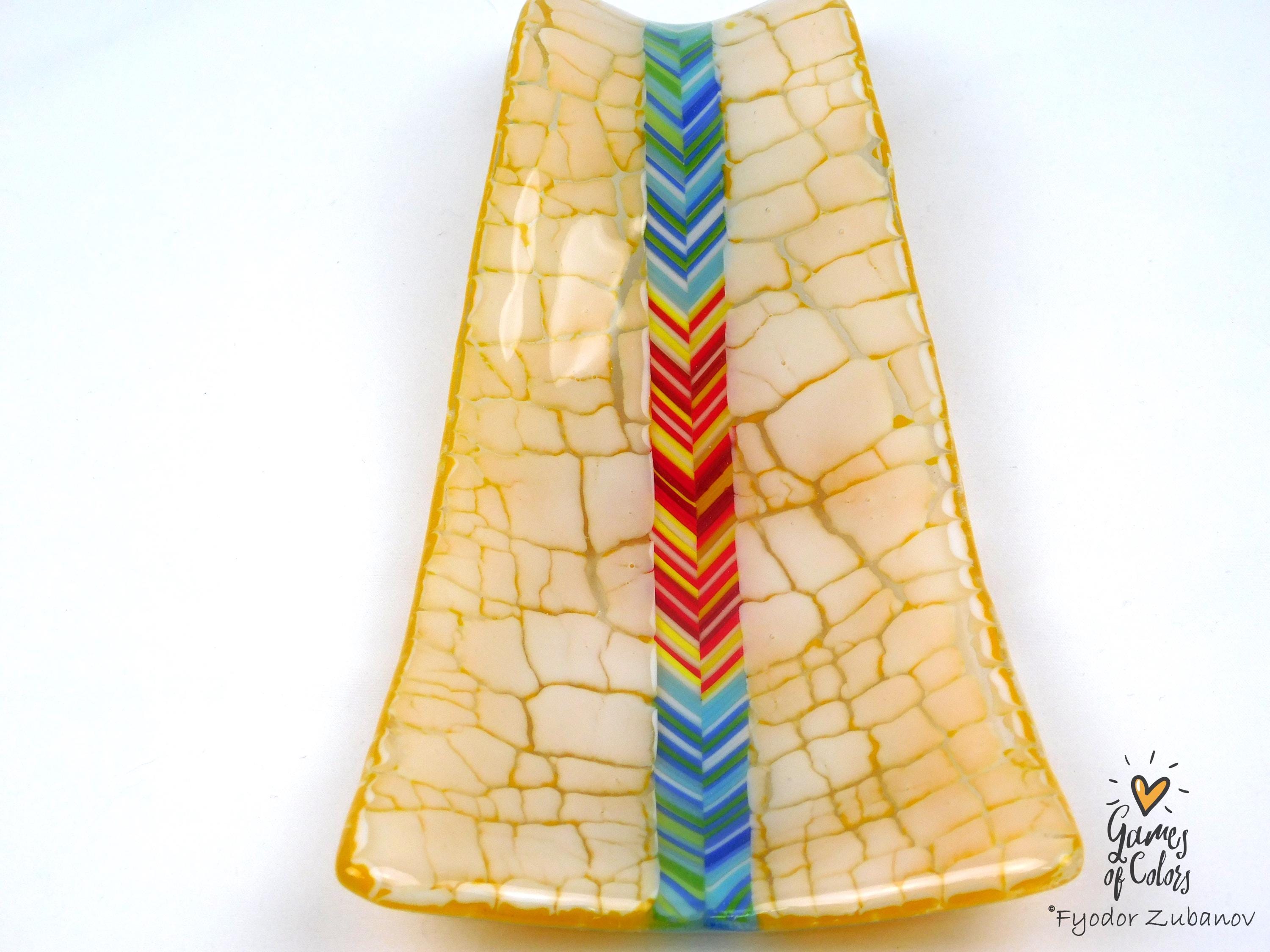 A fused glass decorative spoon rest "Sunburst Drift""