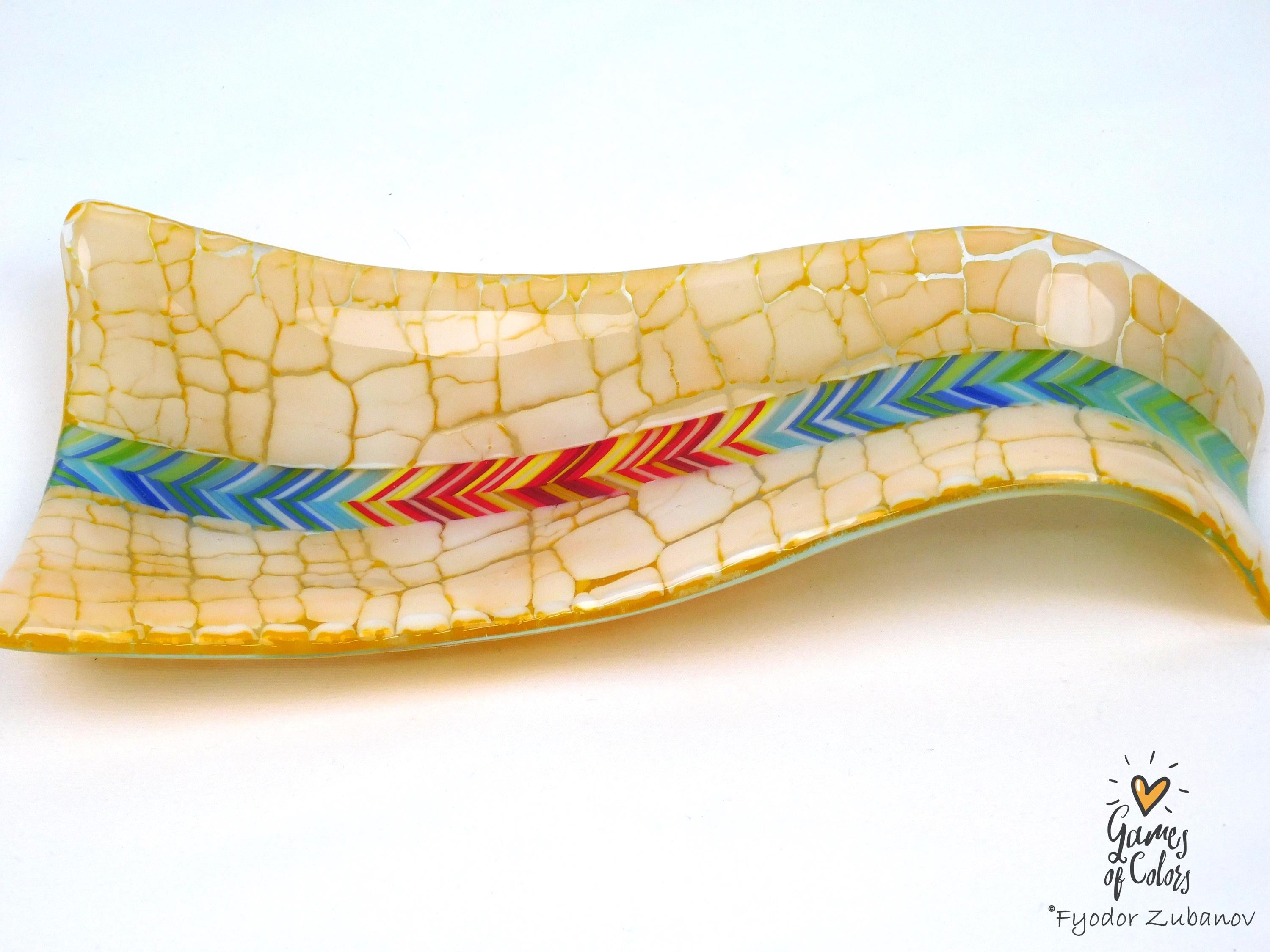 A fused glass decorative spoon rest "Sunburst Drift""
