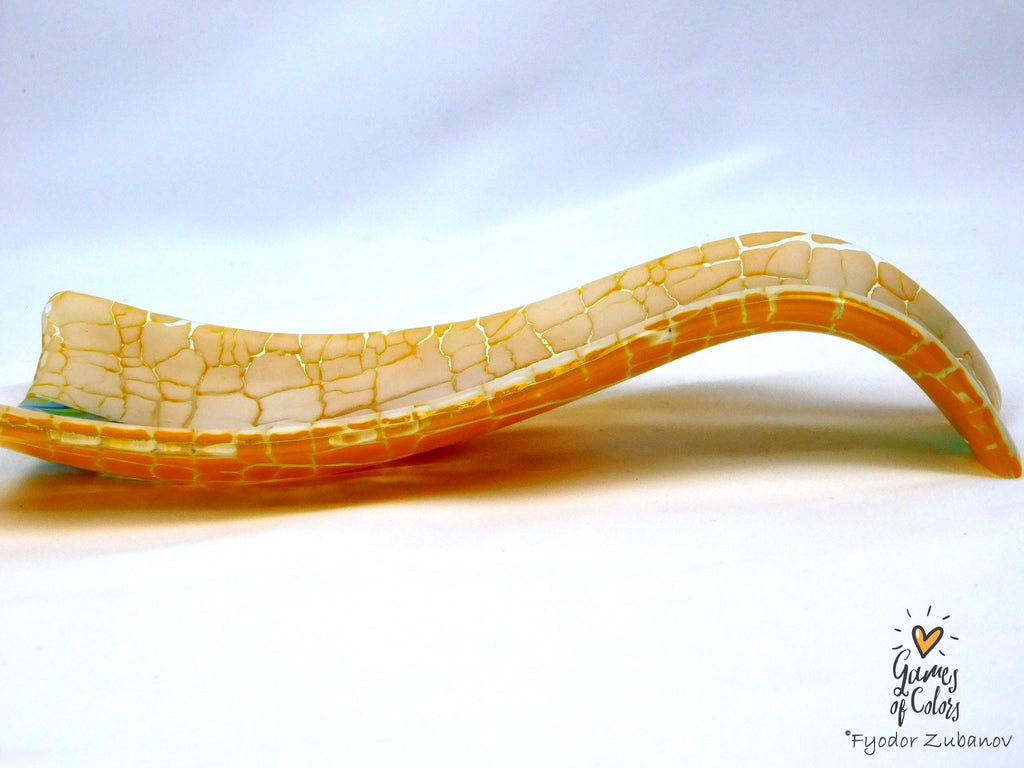 A fused glass decorative spoon rest "Sunburst Drift""