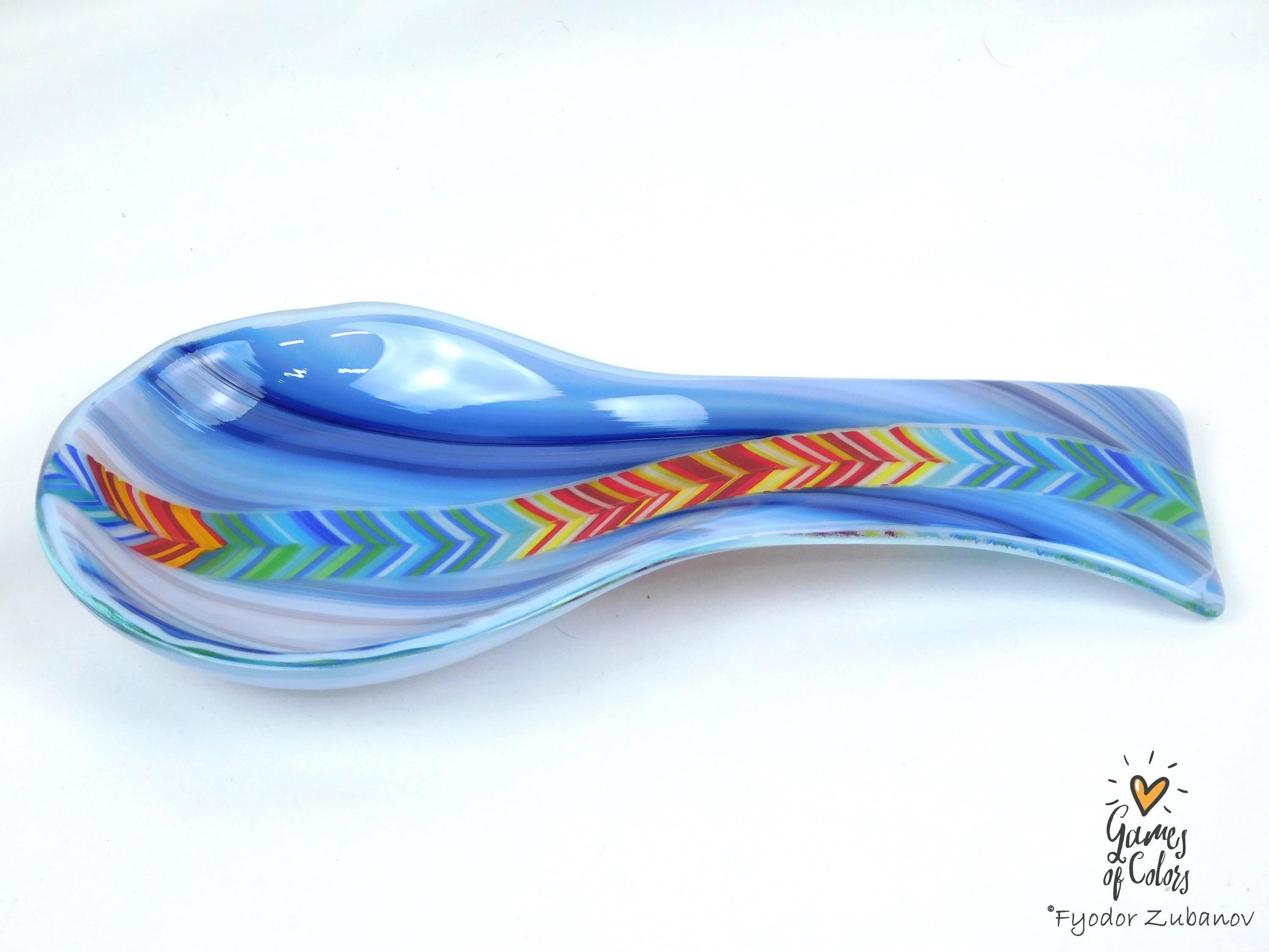 A fused glass decorative spoon rest "Spectrum Leap"