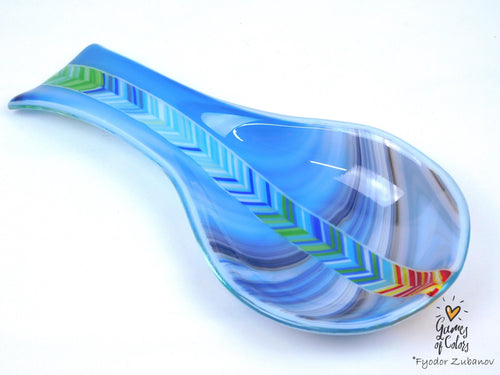A fused glass decorative spoon rest "Spectrum Leap"