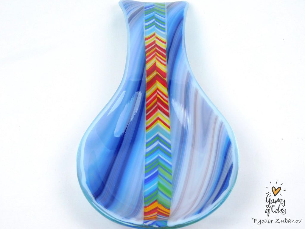 A fused glass decorative spoon rest "Spectrum Leap"
