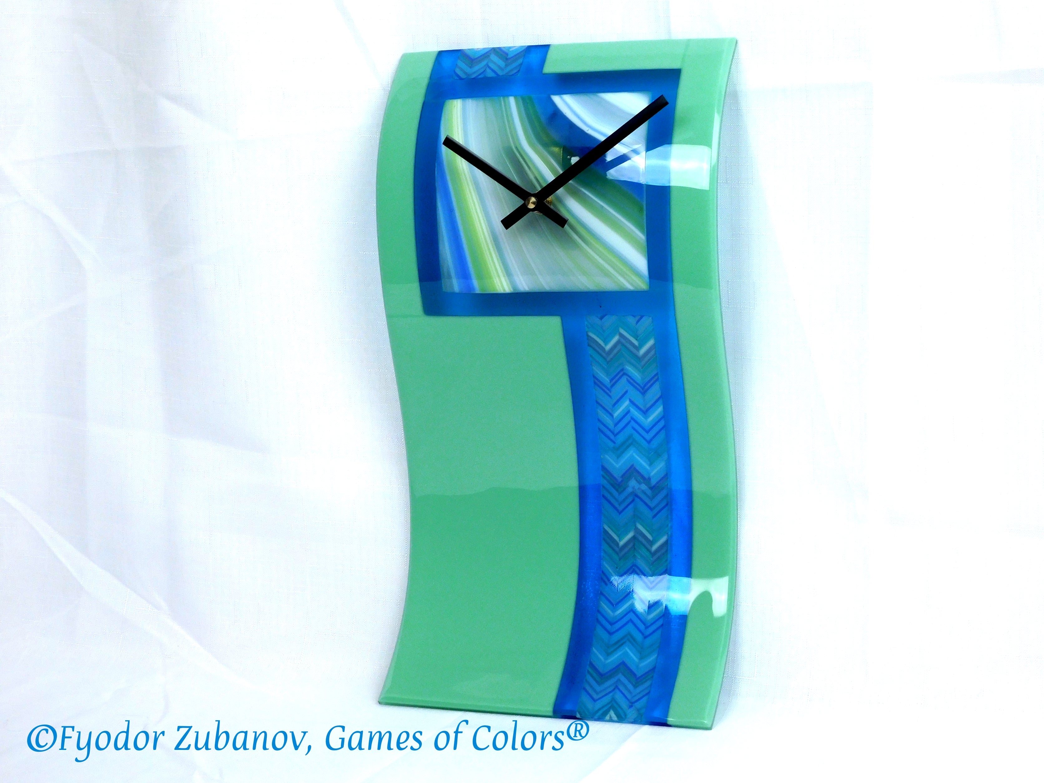 Wall clock Chevrons stream. Blue-green