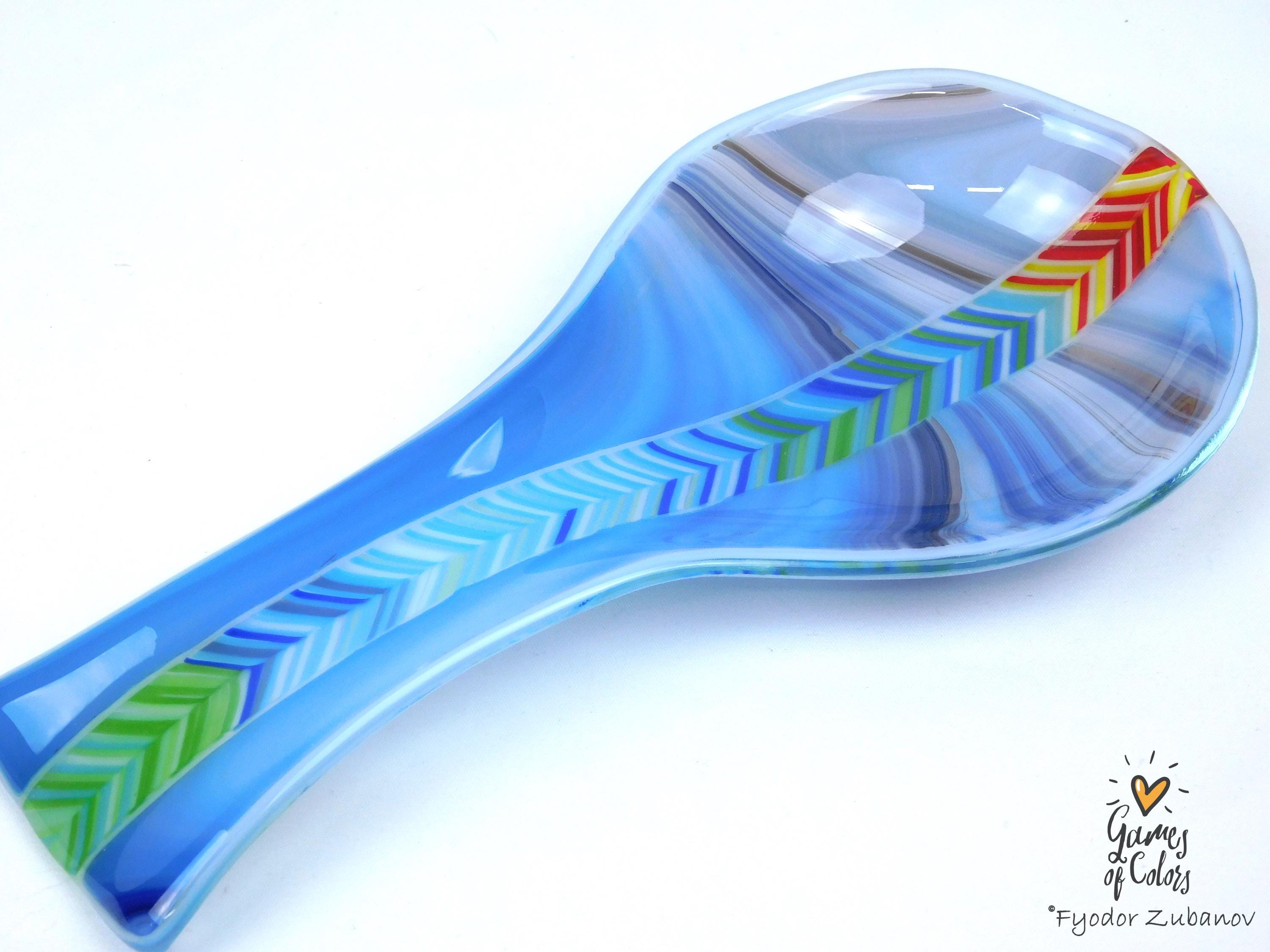 A fused glass decorative spoon rest "Spectrum Leap"