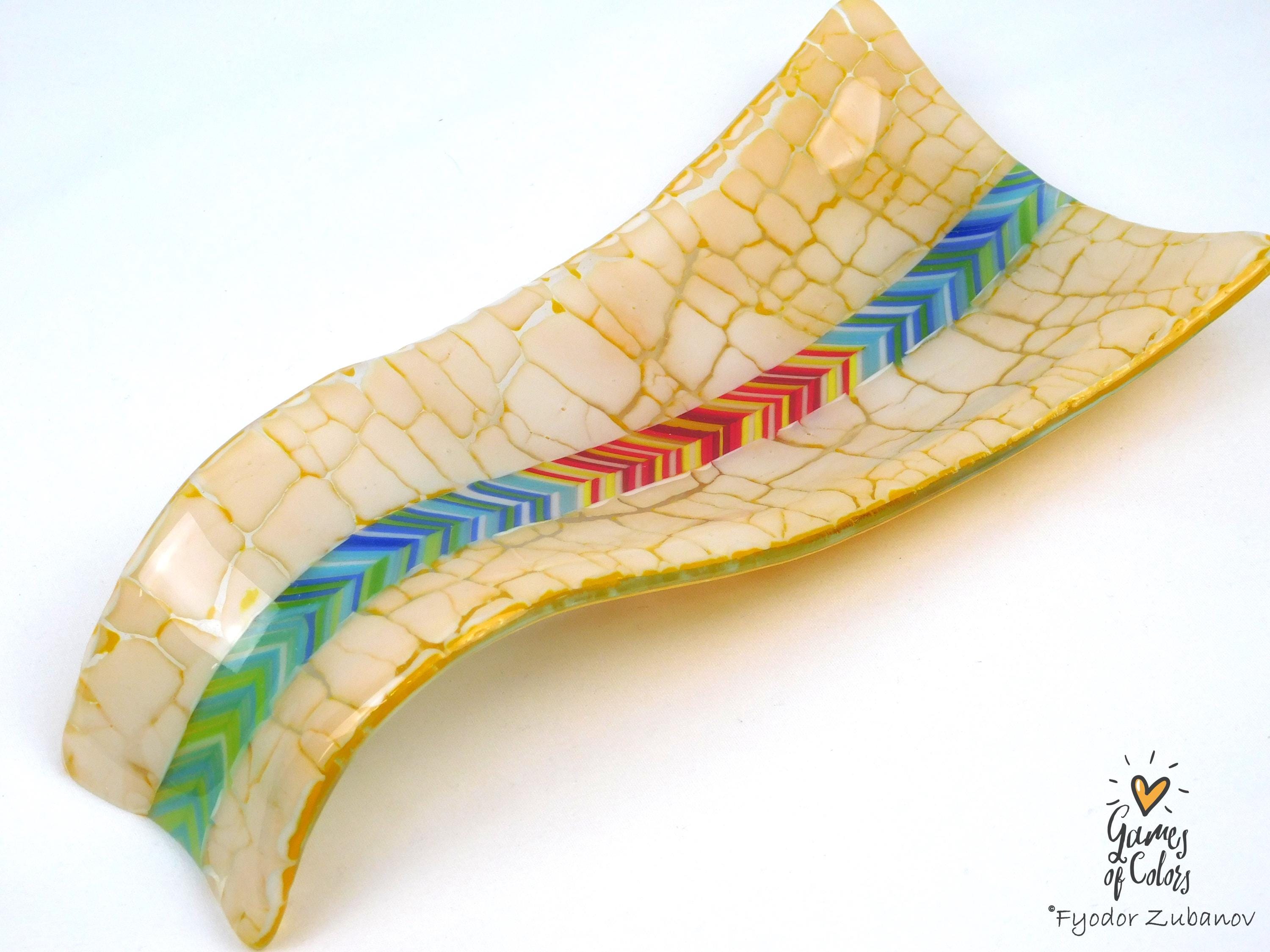 A fused glass decorative spoon rest "Sunburst Drift""
