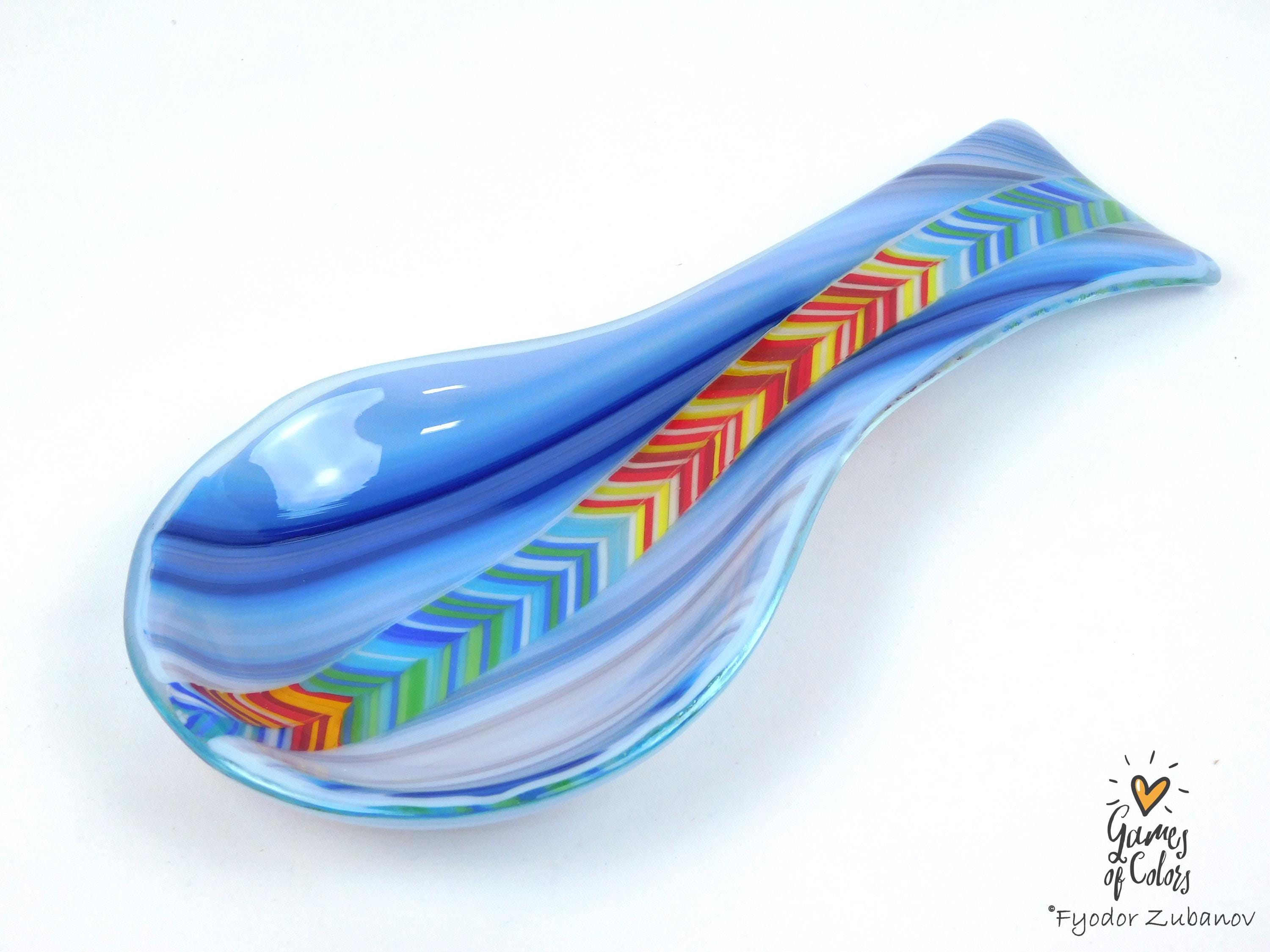 A fused glass decorative spoon rest "Spectrum Leap"