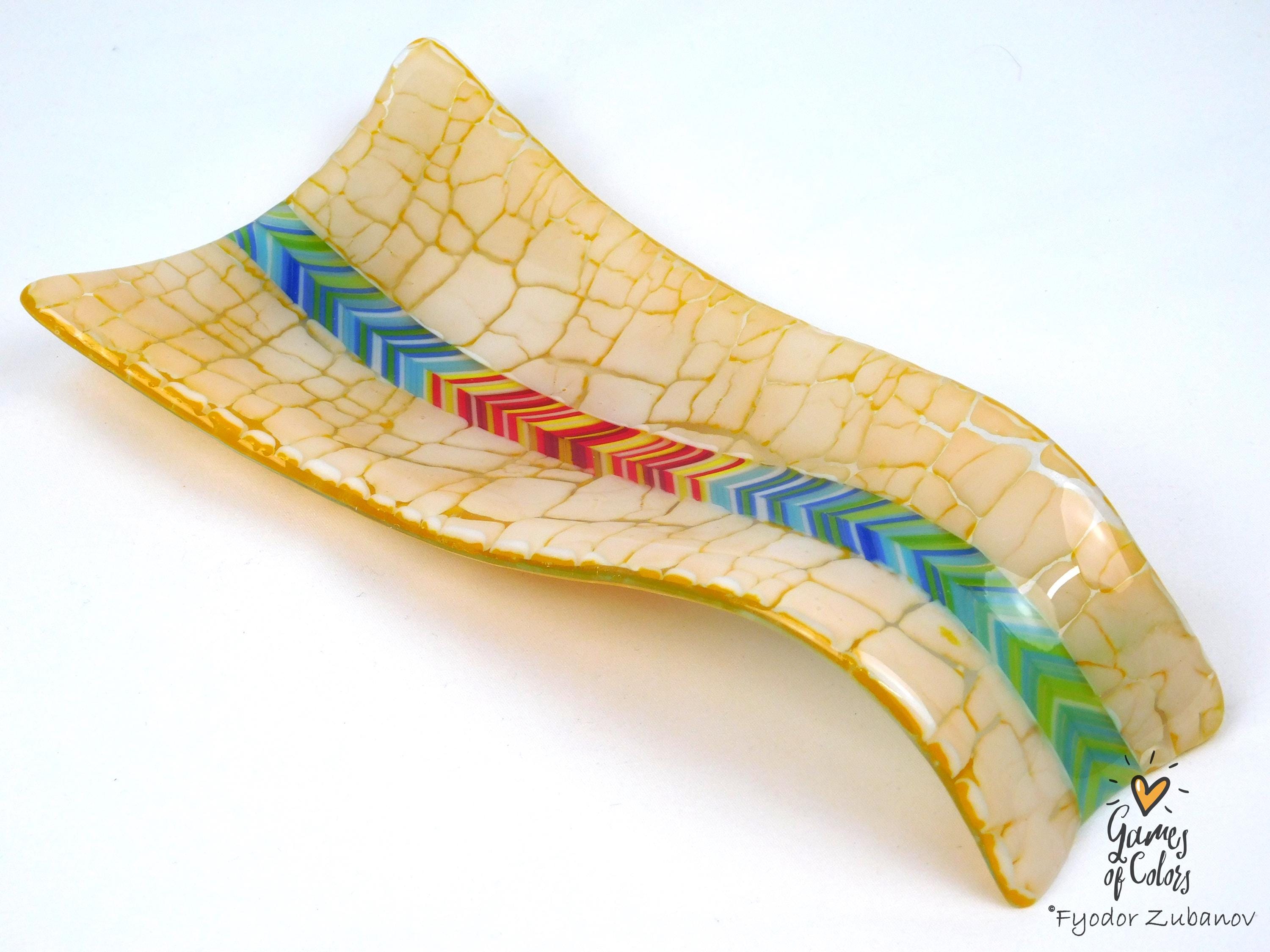 A fused glass decorative spoon rest "Sunburst Drift""