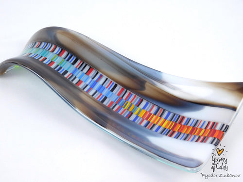 A hand-crafted glass decorative spoon rest "Chromatic current"; fused glass; kitchen accent