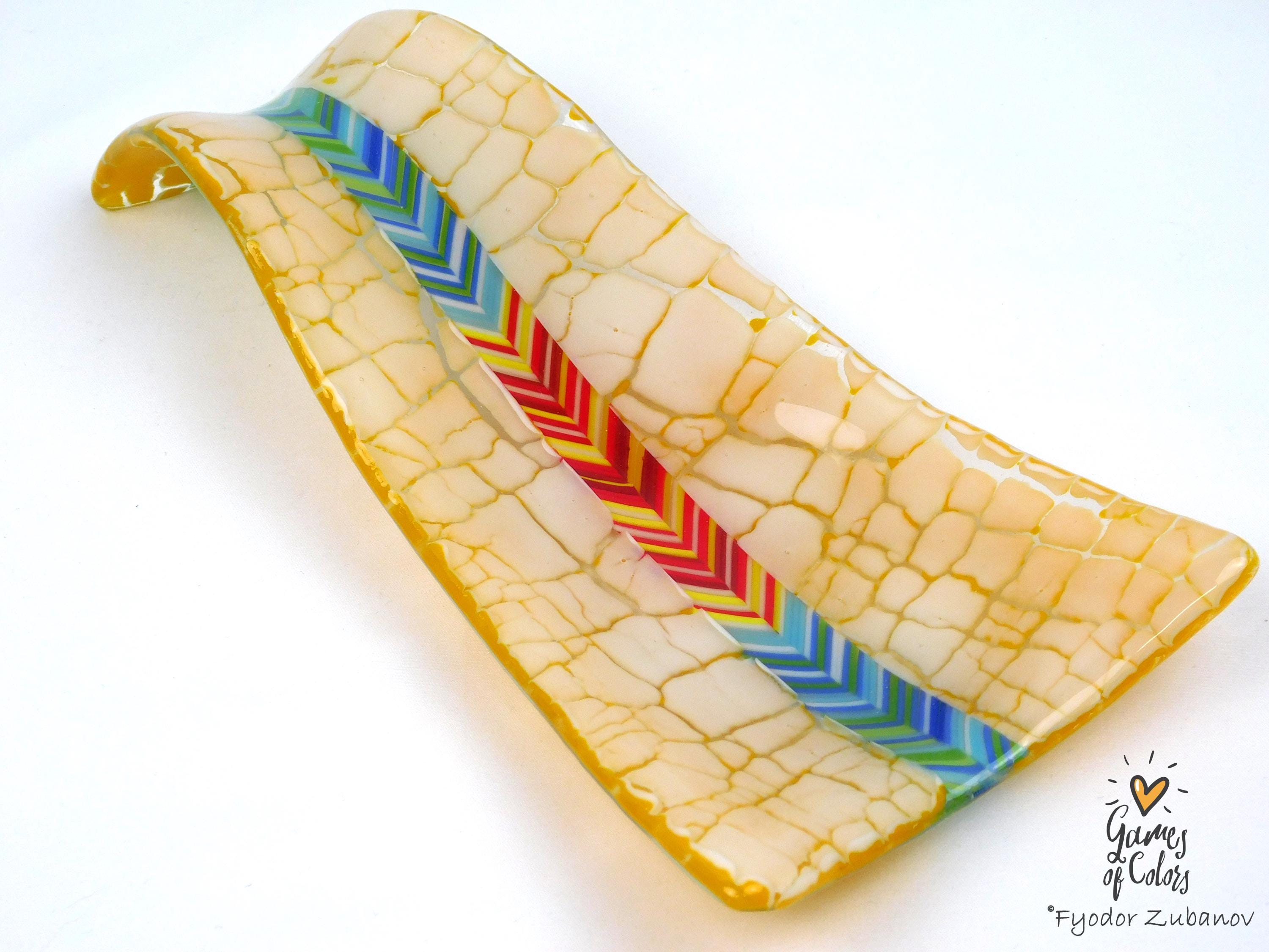 A fused glass decorative spoon rest "Sunburst Drift""
