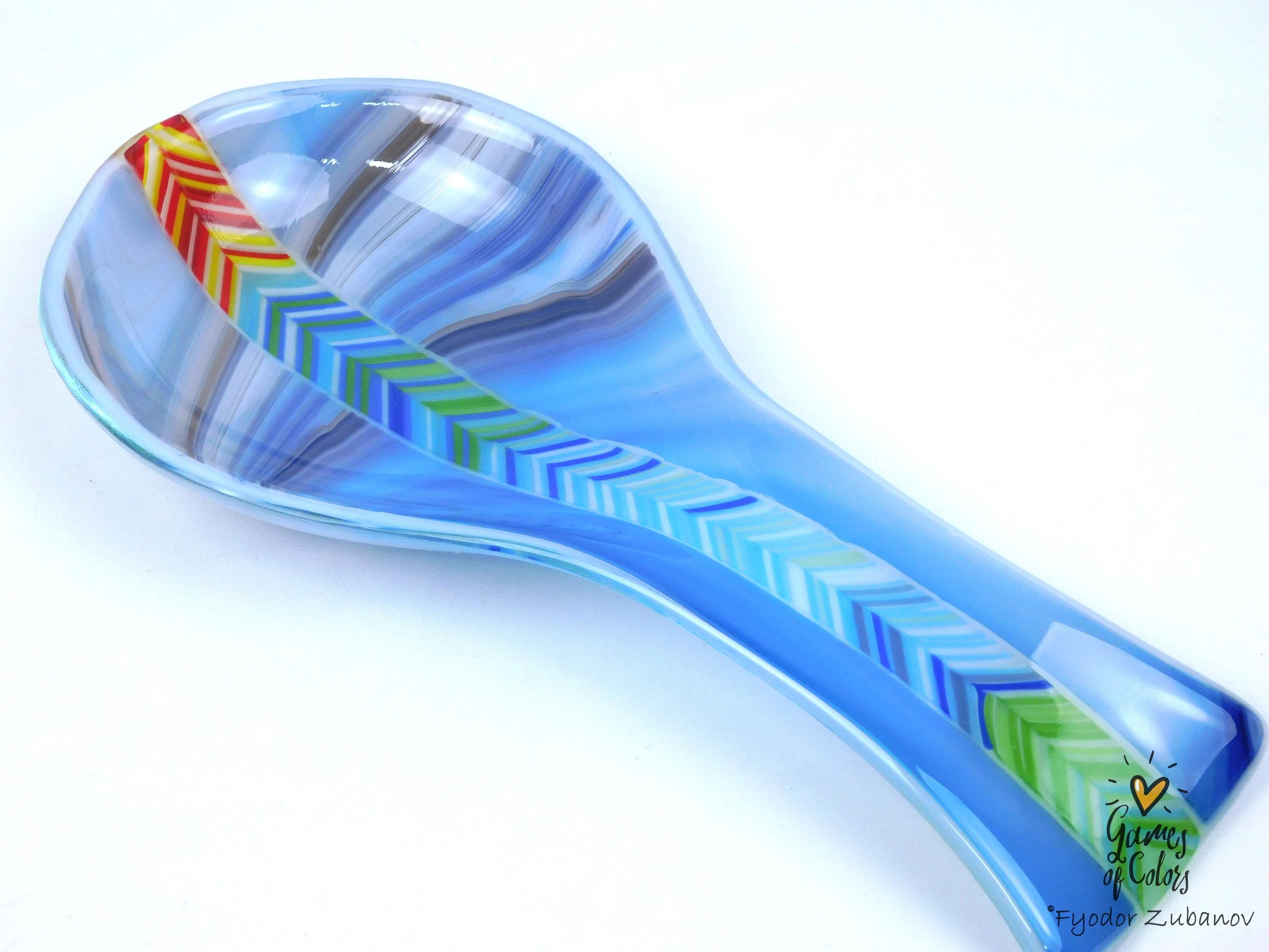 A fused glass decorative spoon rest "Spectrum Leap"