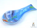 A fused glass decorative spoon rest "Spectrum Leap"